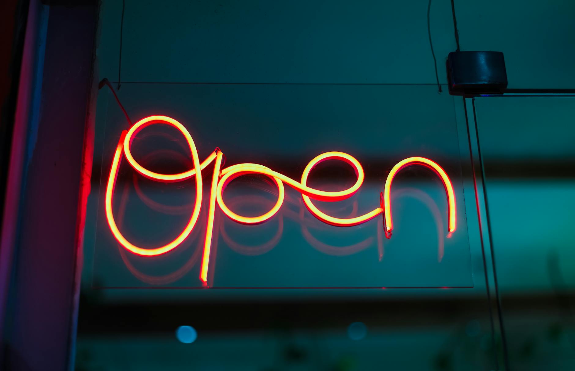 vibrant neon open sign in window display